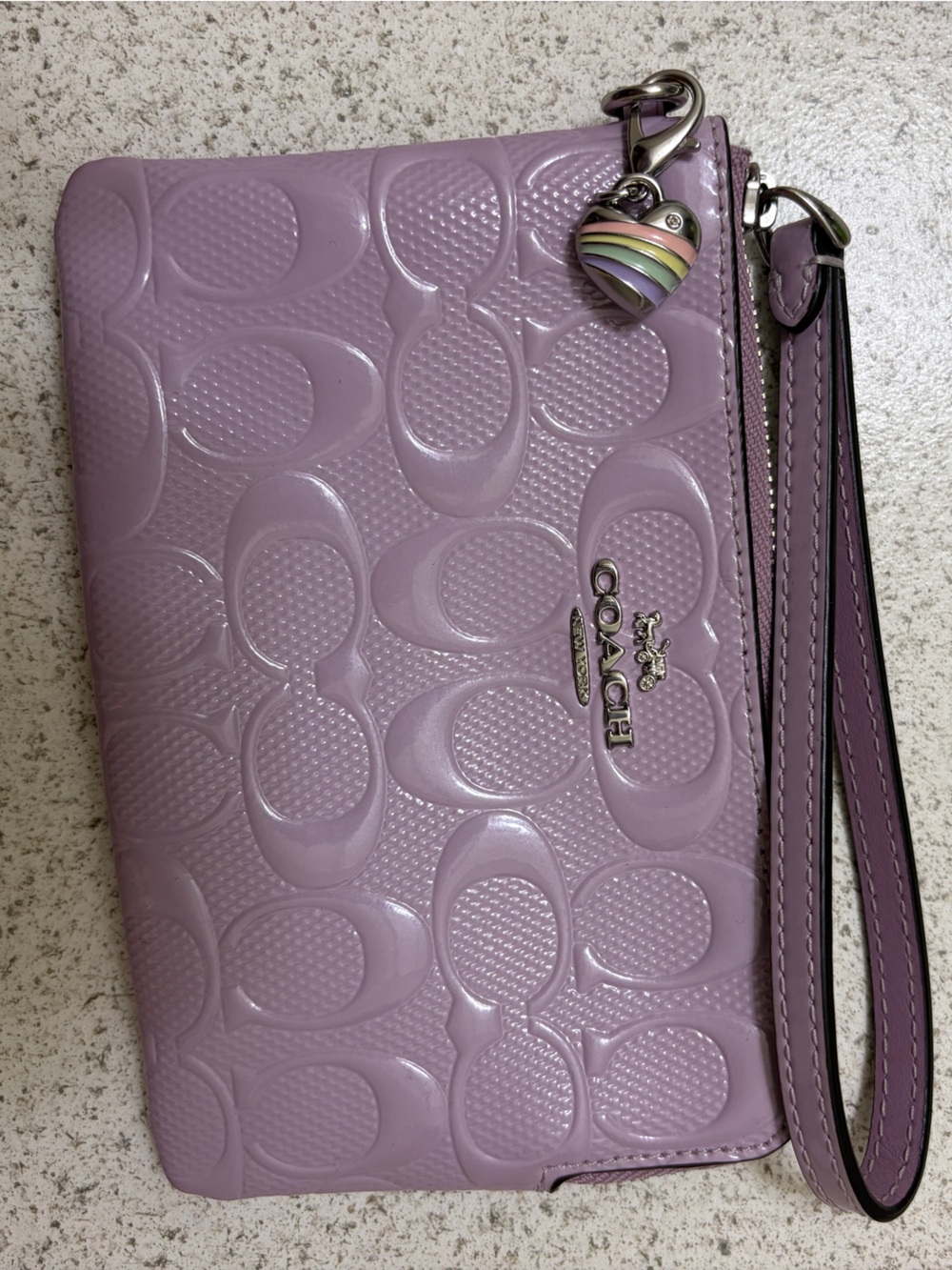 COACH Lavender Embossed Leather Wristlet with Heart Charm